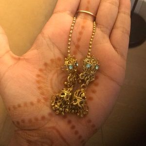 Indian earrings with turquoise stone work.